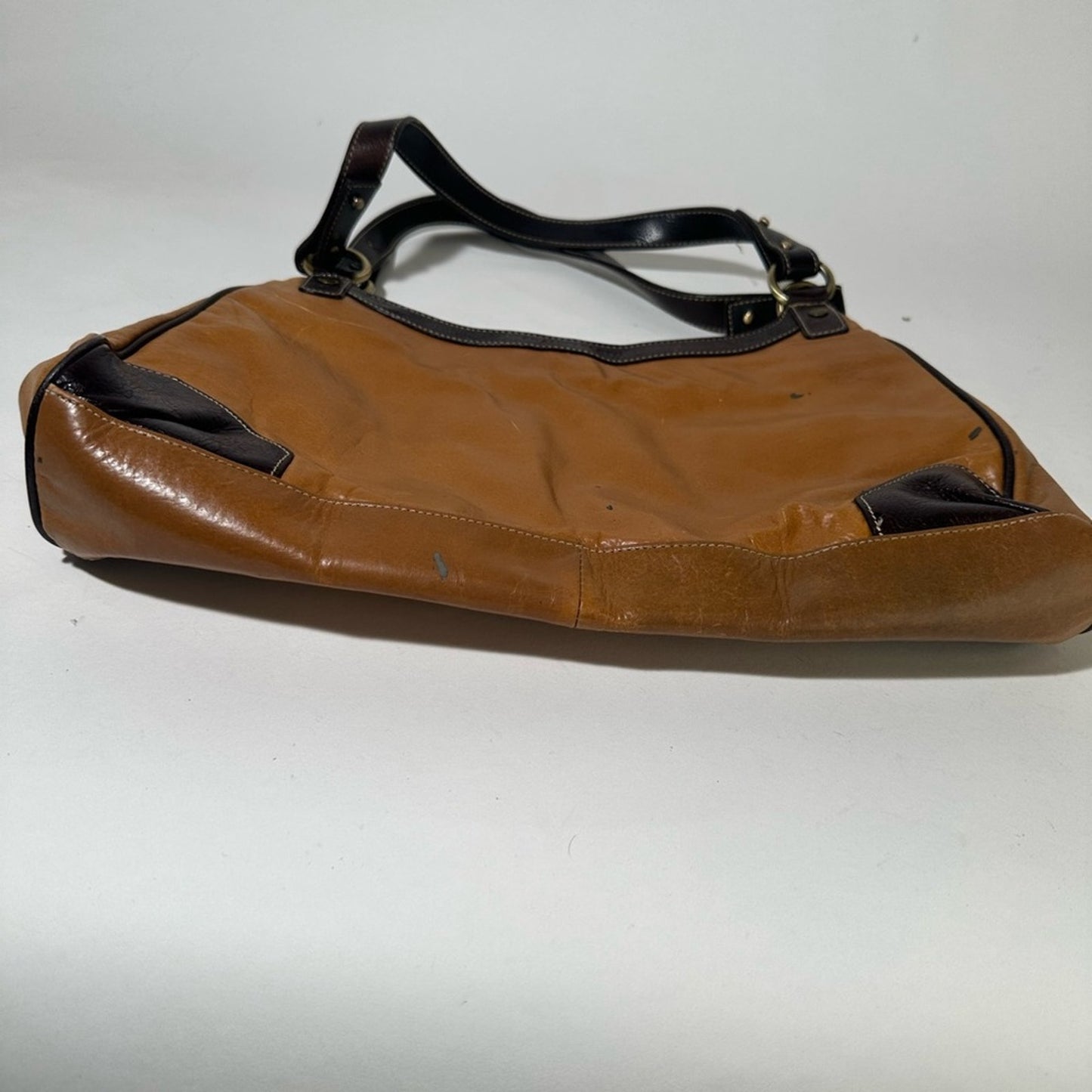 Elegant Brown and Black Leather Shoulder Bag with Adjustable Strap