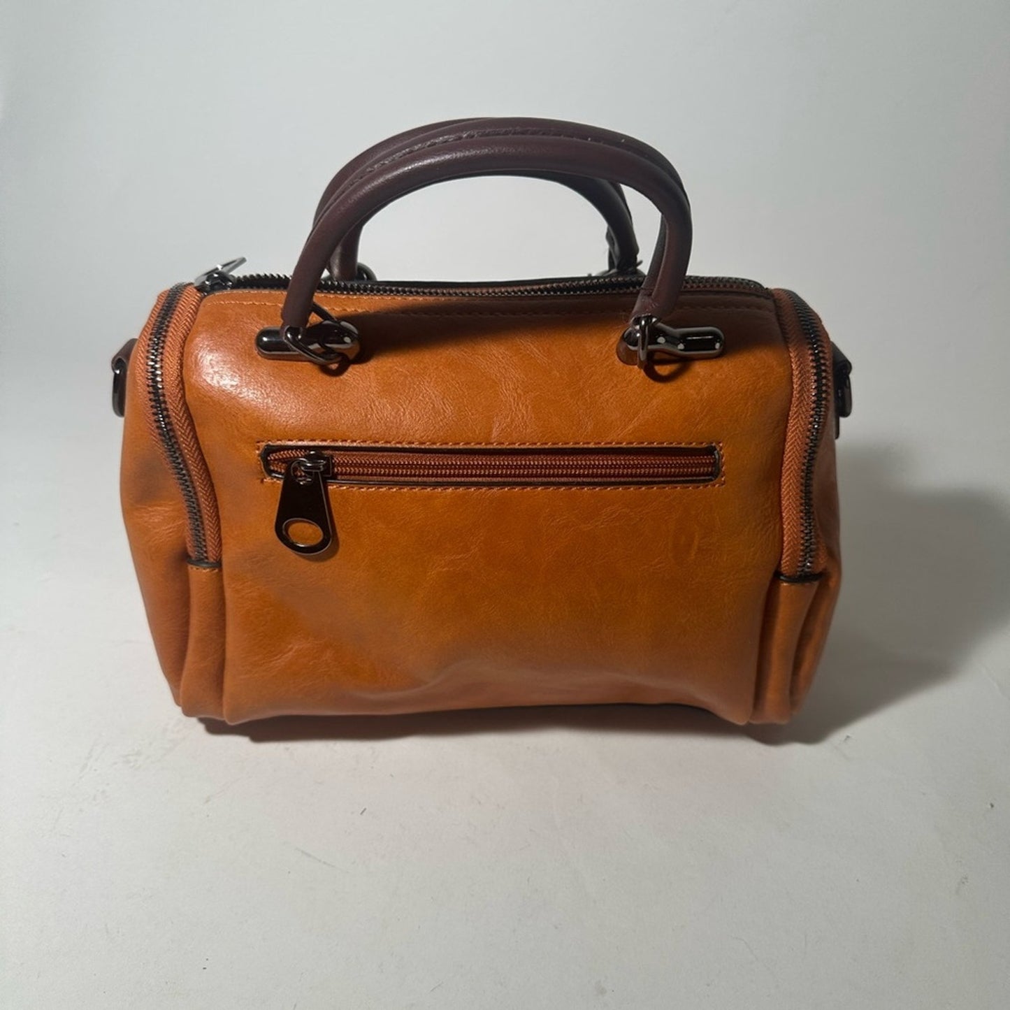 Elegant Tan and Brown Leather Satchel with Tassel Detail
