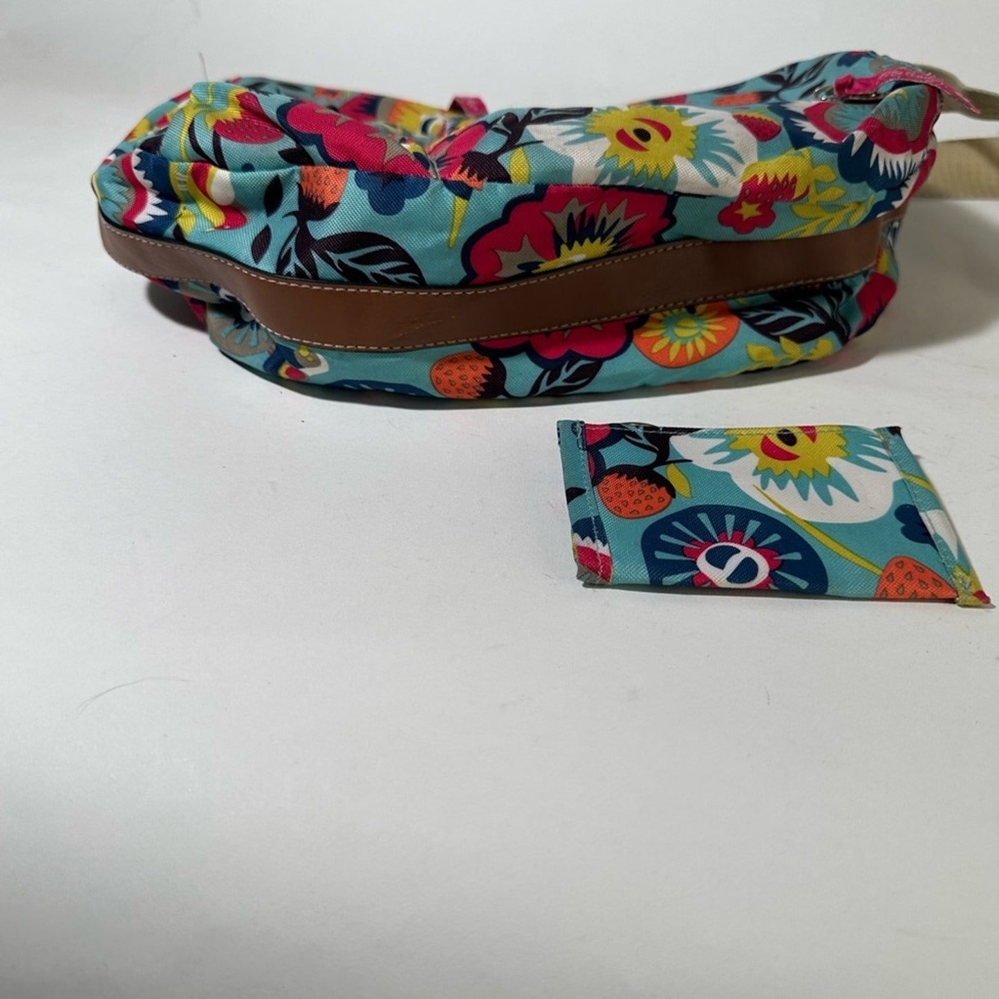 Playful Blue and Pink Crossbody Bag with Abstract Design