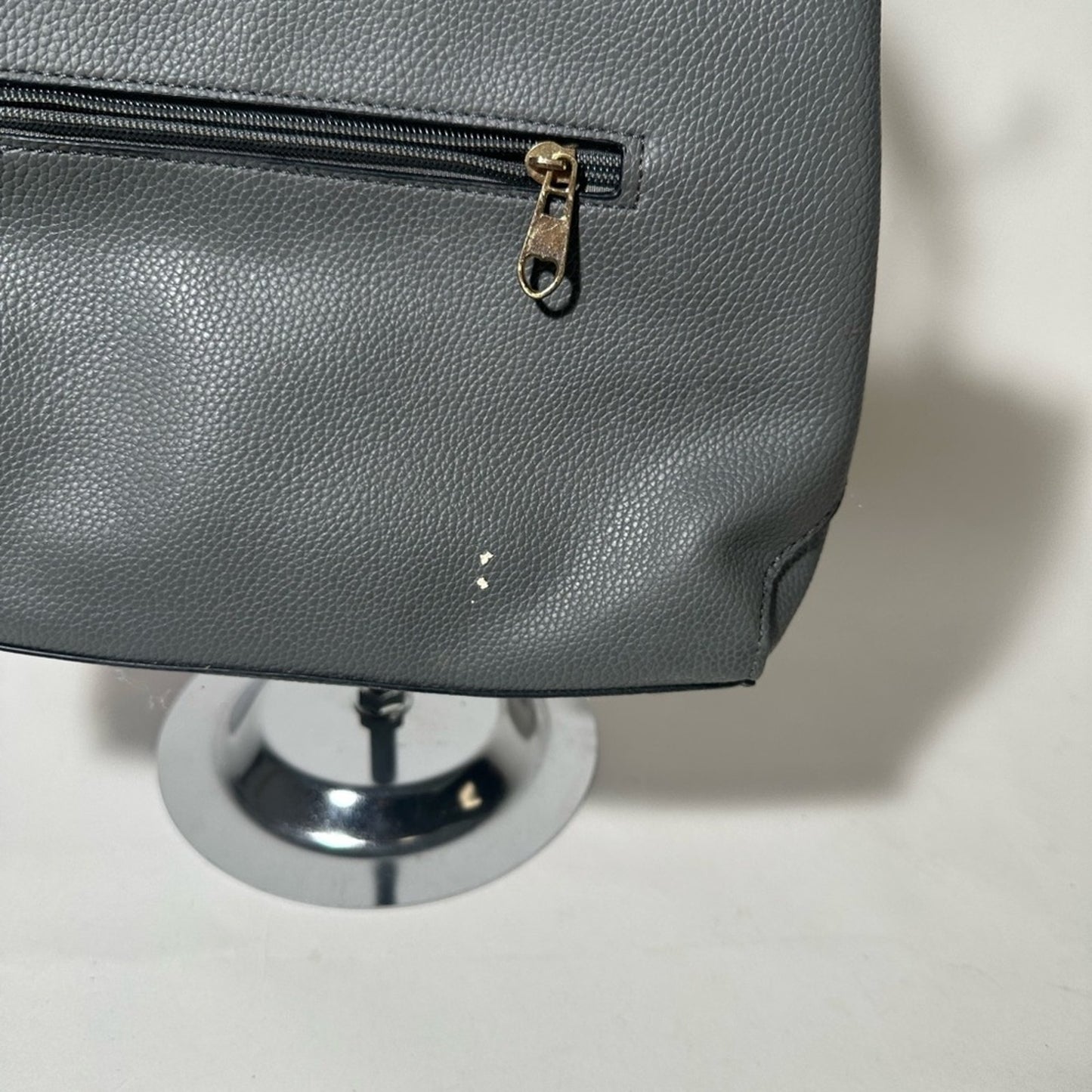 Gray Satchel with Structured Design and Gold Accents