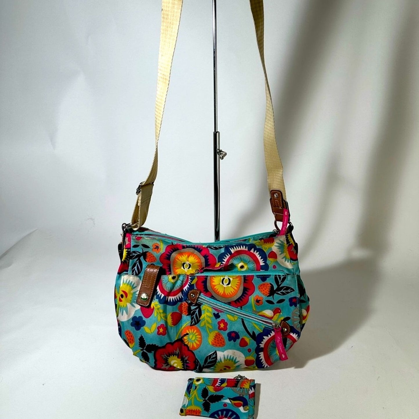 Playful Blue and Pink Crossbody Bag with Abstract Design