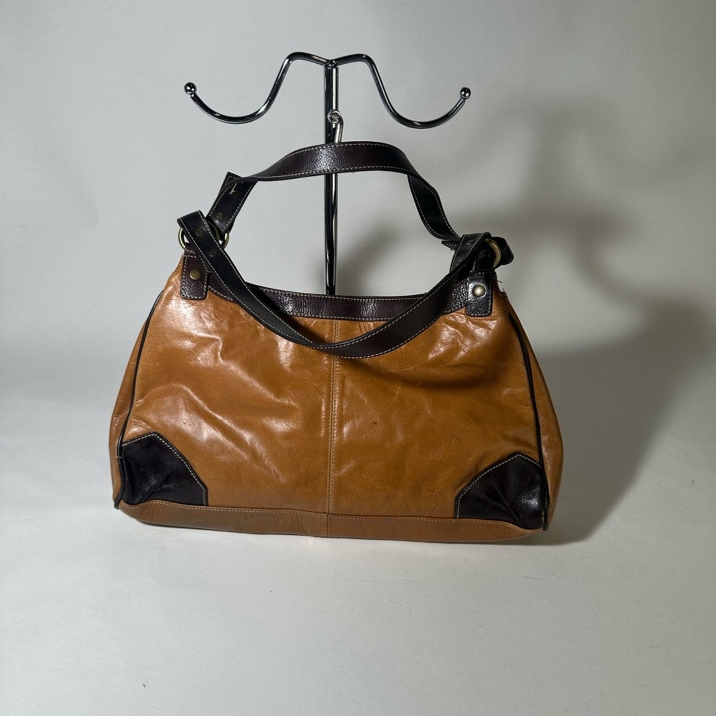 Elegant Brown and Black Leather Shoulder Bag with Adjustable Strap