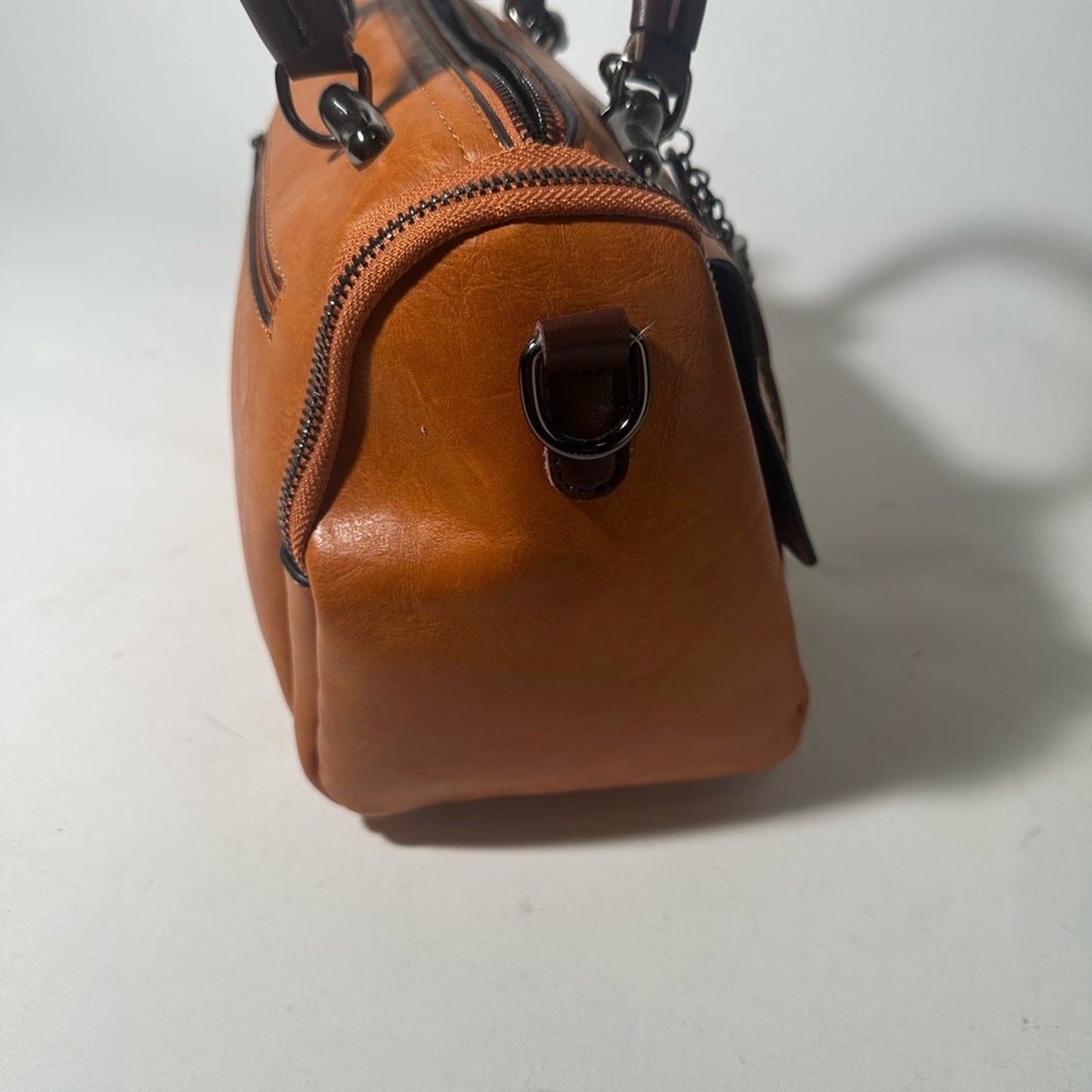 Elegant Tan and Brown Leather Satchel with Tassel Detail