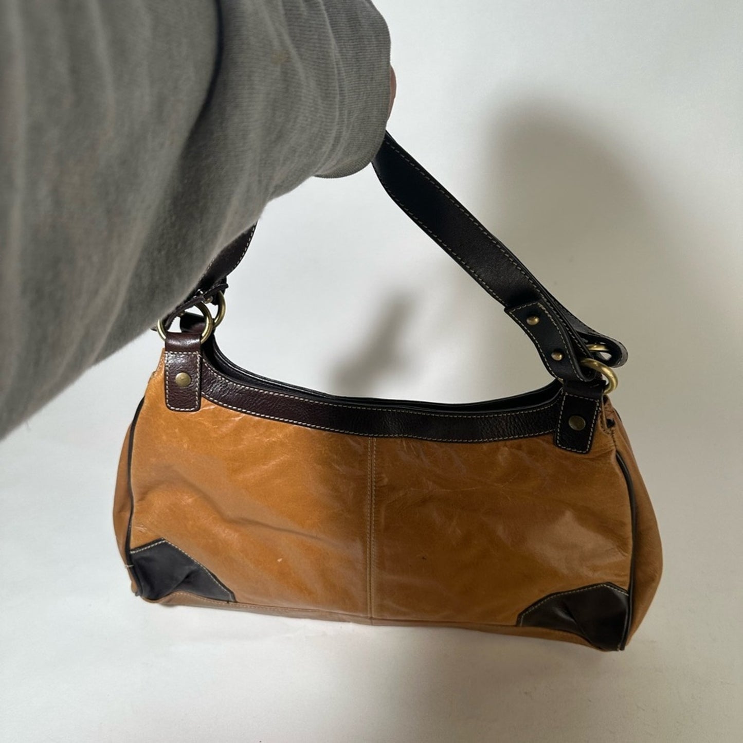 Elegant Brown and Black Leather Shoulder Bag with Adjustable Strap