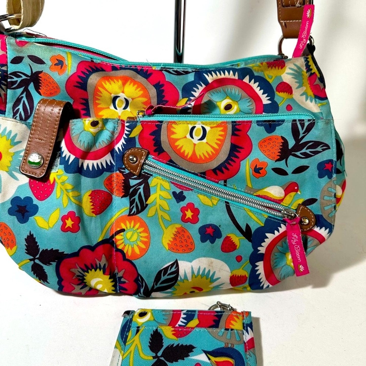Playful Blue and Pink Crossbody Bag with Abstract Design