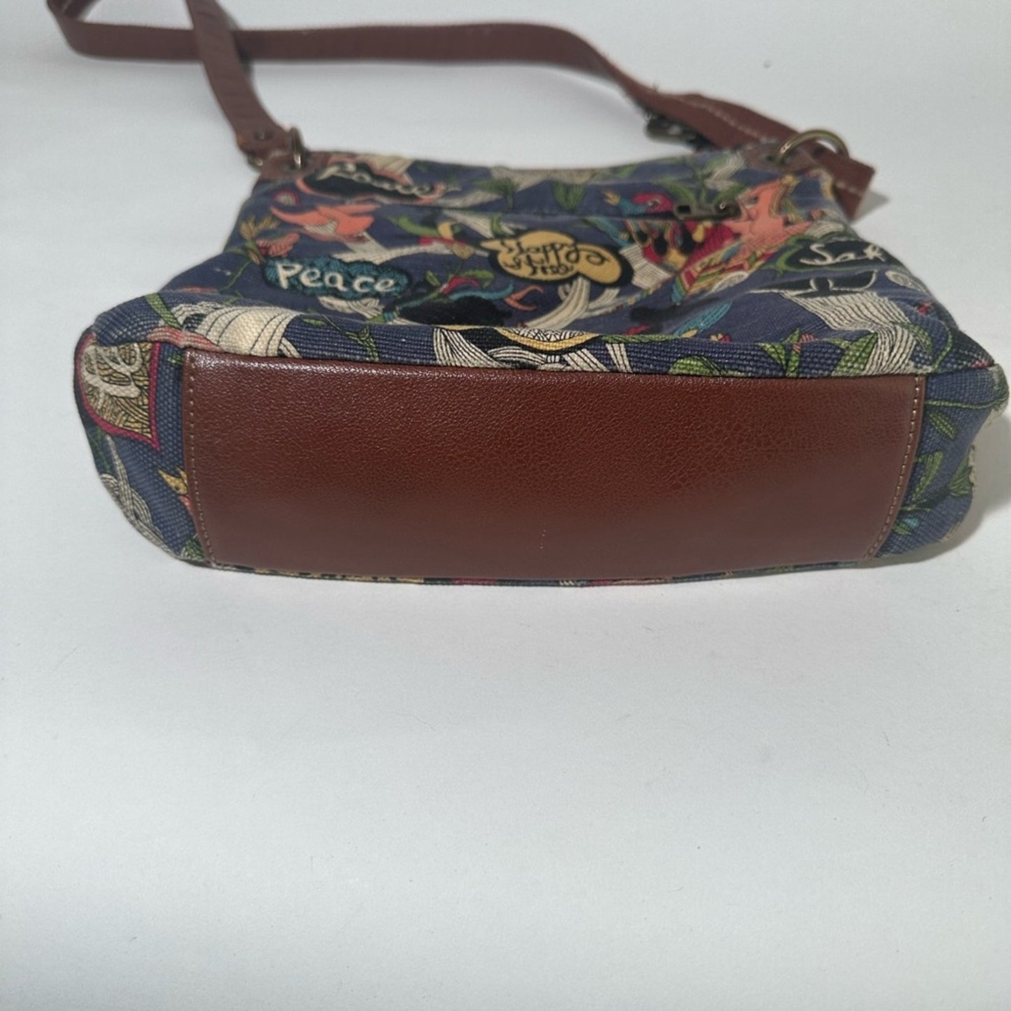 Sakroots Brown Crossbody Bag with Floral Design