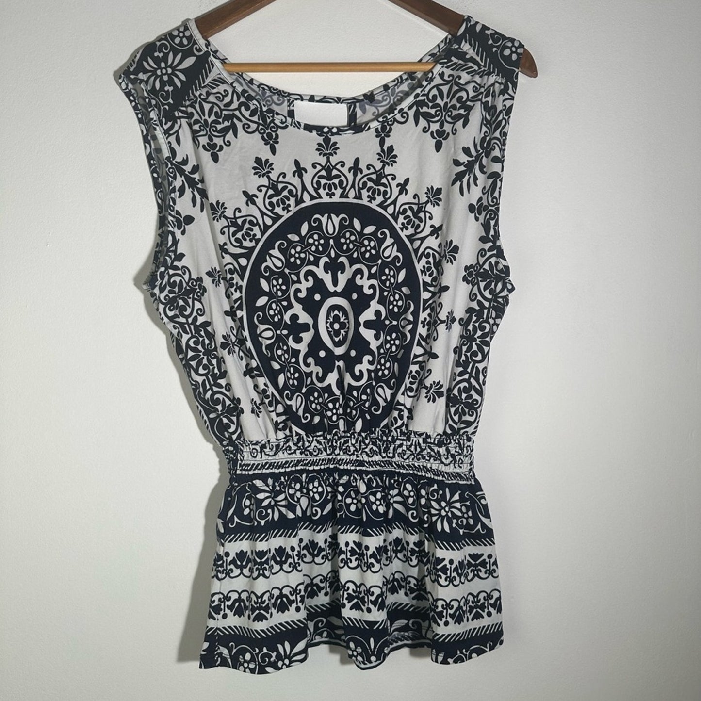 Black and White Peplum Blouse with Intricate Design