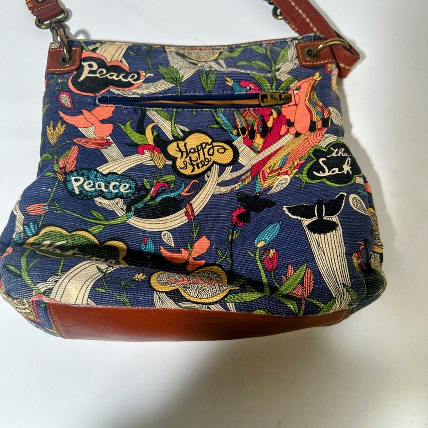 Sakroots Brown Crossbody Bag with Floral Design