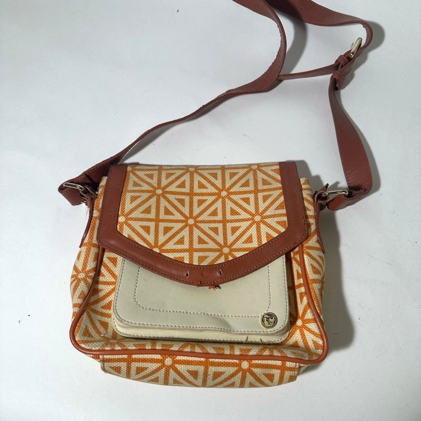 Orange and Cream Geometric Crossbody Bag with Flap Closure