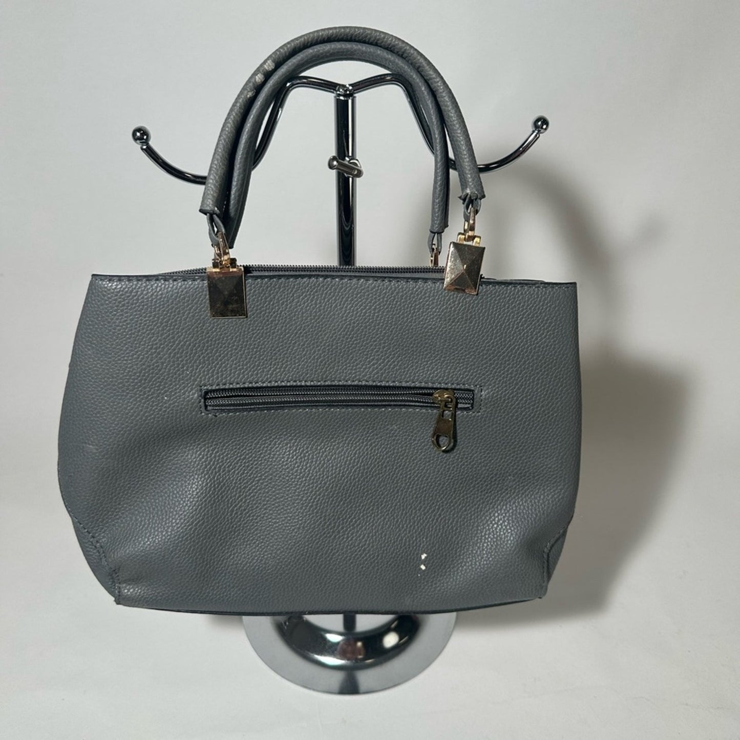 Gray Satchel with Structured Design and Gold Accents