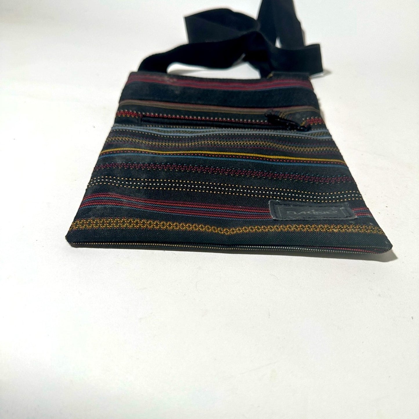 Sleek Black Messenger Bag with Adjustable Strap and Durable Material