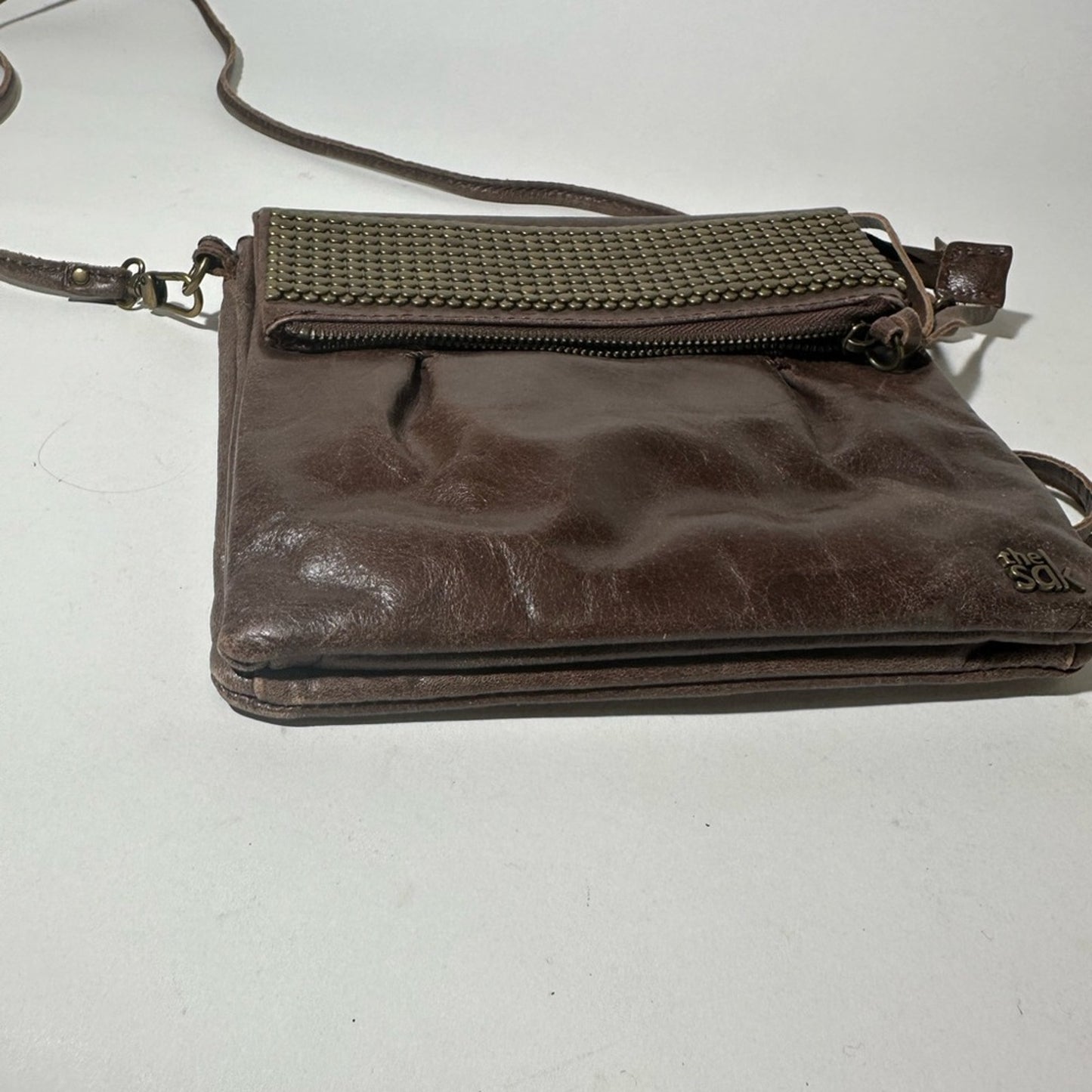 The Sak Brown Crossbody Bag with Metallic Accents