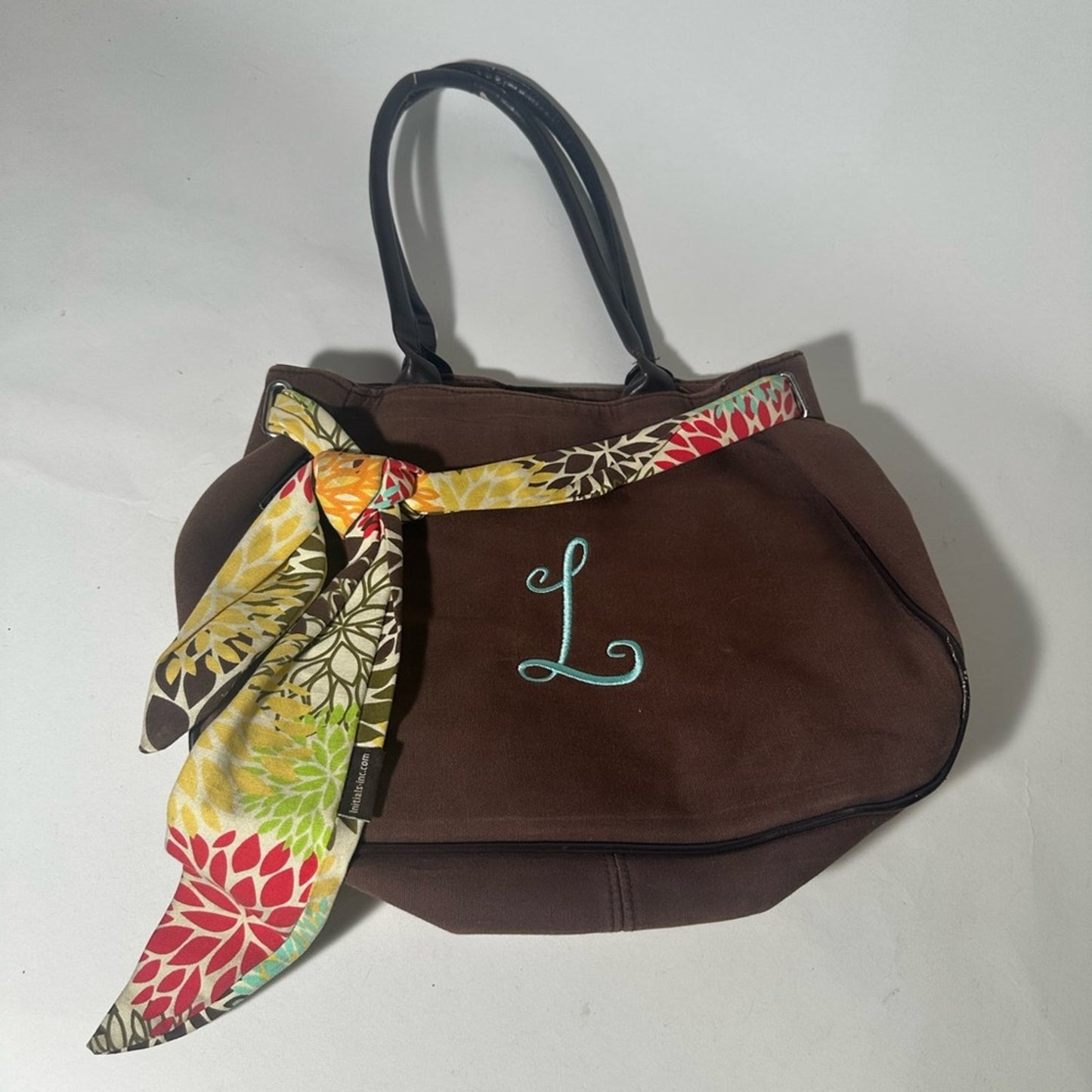 Brown Tote Bag with Colorful Scarf Accent
