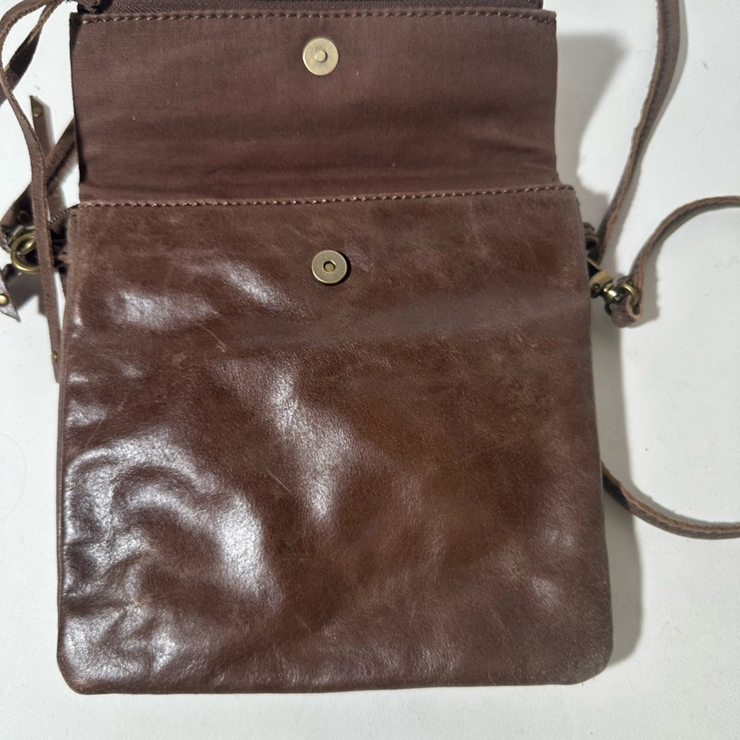 The Sak Brown Crossbody Bag with Metallic Accents