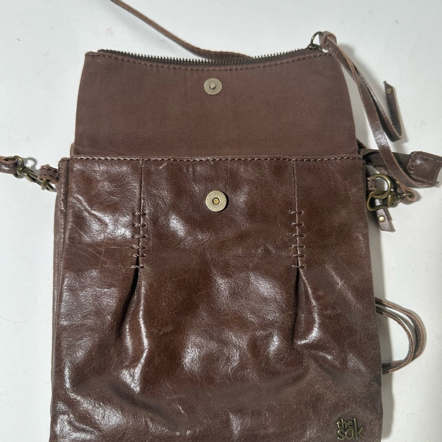 The Sak Brown Crossbody Bag with Metallic Accents
