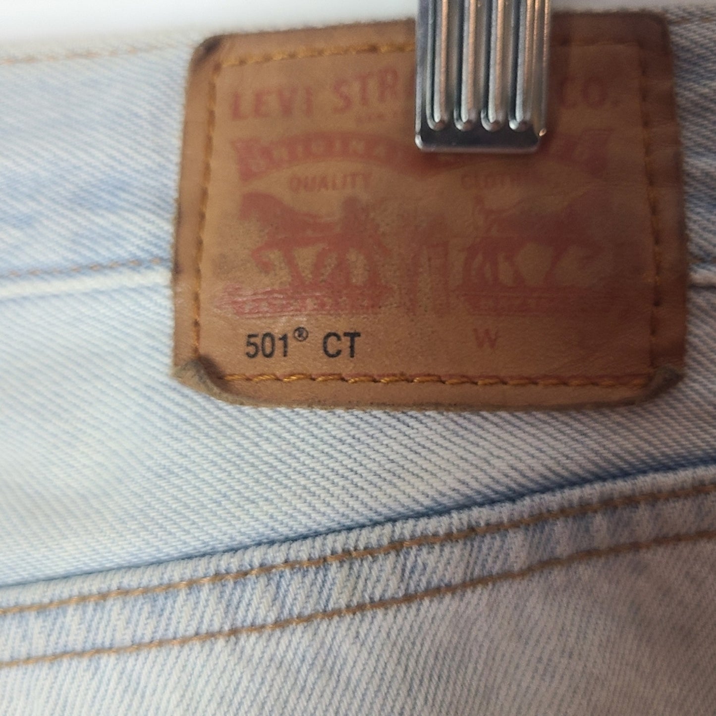 - Levi's 501 CT Distressed Acid Wash Tapered Jean